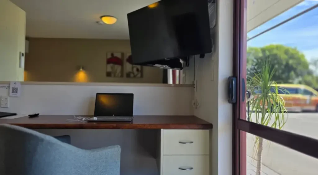 Corporate accommodation room with work desk near Christchurch Airport